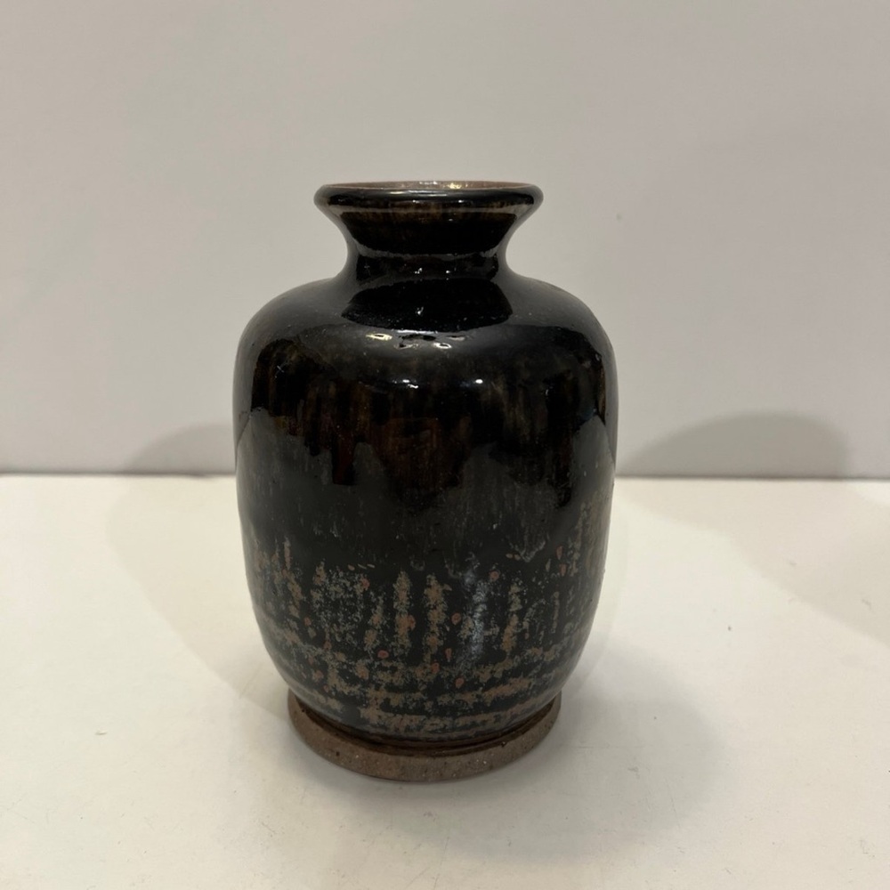Small glazed ceramic black vase
